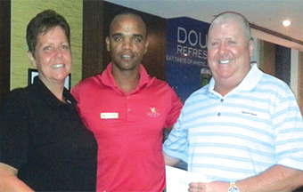 Gulf Weekly Hill couple tee-off in style
